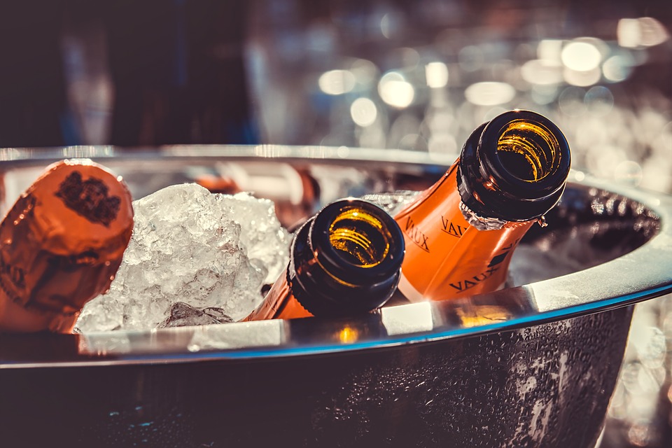 Champagne bottles in an ice bucket