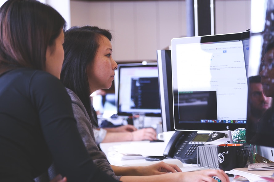 two people researching