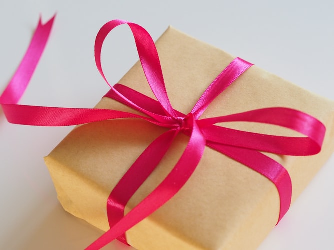 Wrapped box with pink ribbon